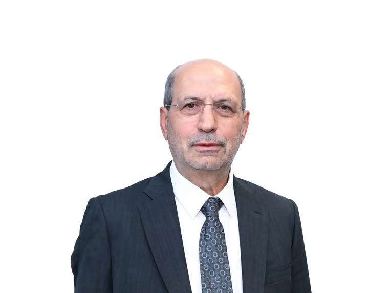 Dr. Muhlis AKAR